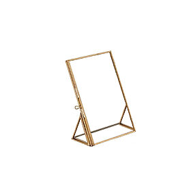 Cadre transparent contour doré, en location chez Pink Event